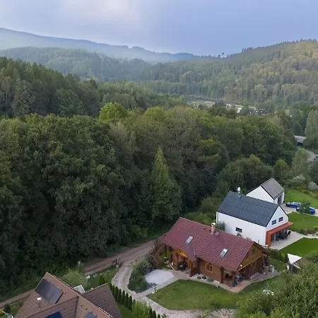 Apartmán ve srubu s balkónem